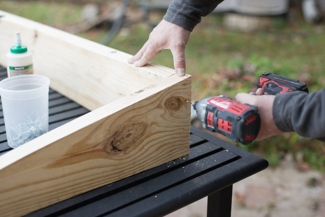 Pressure-treated wood deck construction